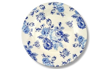 Top view of a ceramic plate featuring beautiful floral designs, isolated on white background.