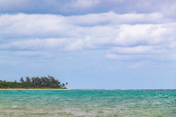 Tropical Caribbean beach clear turquoise water Playa del Carmen Mexico.