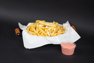 Gourmet Parmesan French Fries on White Paper: Crispy Golden Potato Sticks with Cheese, Fast Food...