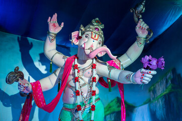 Fototapeta premium A Closeup shot Ganpati Installed in a Pandal during the 10 Day Ganesh Festival, the idols are immersed in heavy water bodies after the 10 days.