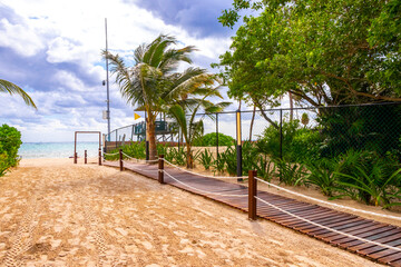 Natural tropical mexican caribbean beach entrance Playa del Carmen Mexico.