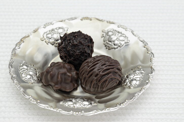 chocolate candies on a plate
