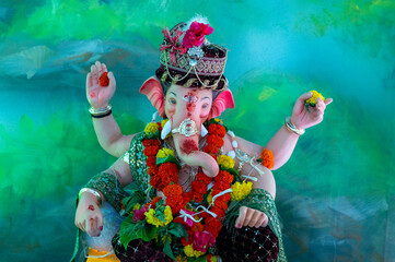 A Closeup shot Ganpati Installed in a Pandal during the 10 Day Ganesh Festival, the idols are immersed in heavy water bodies after the 10 days.