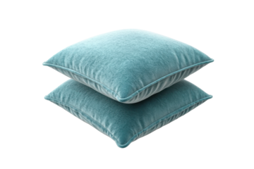 Two teal pillows stacked together, showcasing soft texture and comfortable design for home decor and relaxation.