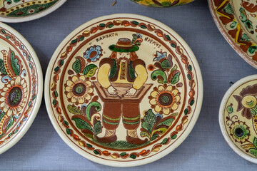 Ukrainian plates. Clay ceramics food. Kosiv painting. Carpathians Yaremche style dishes.