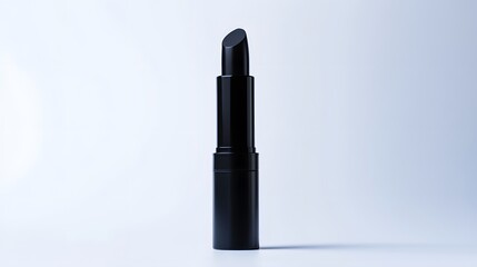 Obraz premium Matte Lipstick Tube: A matte black lipstick tube standing upright on a white background, with minimal reflections and clean lines. 