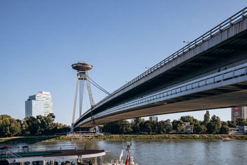 Obraz premium Bratislava, Slovakia - August 7, 2024: The Slovak National Uprising Bridge in Bratislava, also known as Most SNP