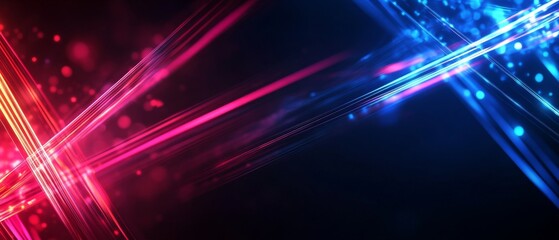 Obraz premium A vibrant abstract background featuring dynamic light streaks in blue and pink, perfect for modern designs and digital projects.