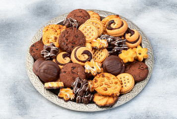 Mix of cookies . Many unhealthy snacks . Top view