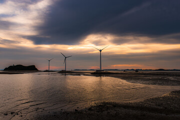 A picture of windmill on the sea at Tando port in South Korea