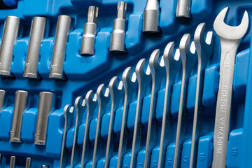 Fototapeta premium open ended wrench set in a toolbox, close up