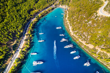 Paradise Bay (Turkish: Cennet Koyu) in Bodrum. Mugla, Turkey. One of the most beautiful bays in Bodrum with blue sea and nature. Drone shot.