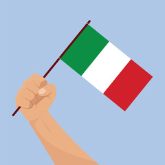 Hand holding Italy national flag