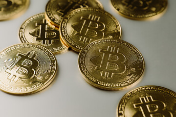 Bitcoins on a table. Investing in crypto currency. Buying digital assets.