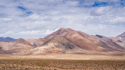 Colorful high altitude desert landscape along Pamir Highway, Murghab, Gorno-Badakhshan, Tajikistan