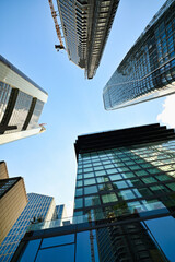 Modern highrises and Office buildings seen from below, in the financial district of a modern city. 