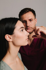 Rhinoplasty. Woman is going through nose surgery to constantly remove dorsal hump. Rhinoplasty to...