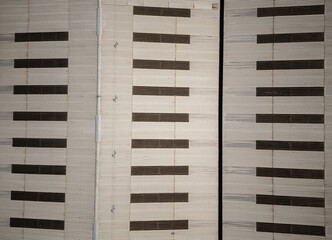 Aerial view of industrial warehouse roof with a missing window