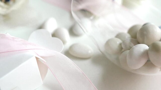 Italian confetti candy (italian sugared almonds) and bomboniere, Concept of a traditional wedding