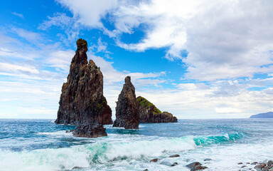 Tall lava rocks in ocean, islet towers in Ribeira da Janela, Madeira Island, Portugal