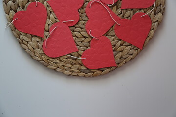 Red paper hearts garland is romantic decoration for Saint Valentine day.