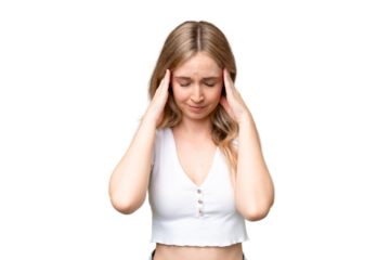 Young English woman over isolated background with headache