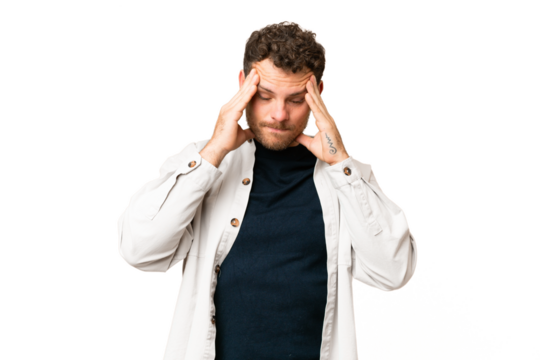 Brazilian man over isolated chroma key background with headache
