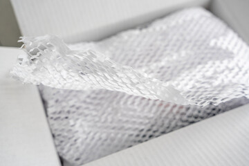 Corrugated white paper for safe transportation, in which the goods brought by the courier delivery...