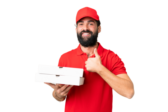 Pizza delivery man with work uniform picking up pizza boxes over isolated chroma key background giving a thumbs up gesture