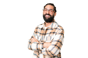 Young man with beard over isolated chroma key background with arms crossed and looking forward