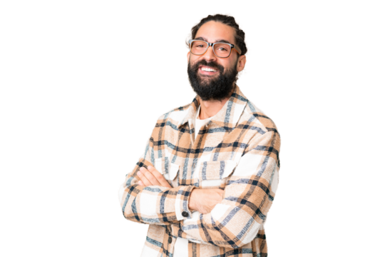 Young man with beard over isolated chroma key background with arms crossed and looking forward