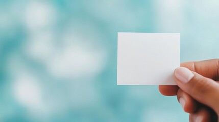 Close-up of a hand holding a mindful affirmation card, promoting positive thinking