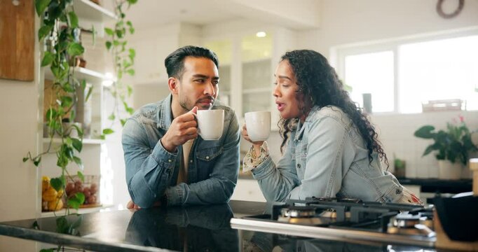 Couple, laughing and drinking coffee with cheers in home for celebration, happy and funny conversation in kitchen. People, toast mug and bonding with beverage in house for support and congratulations