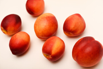 Juicy peaches on a white background. Ripe nectarines.