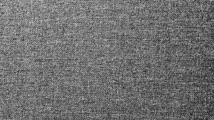 Textured of Gray cotton for background. Grey suface of sofa wallpaper in monochrome or black and white style. Soft materail.