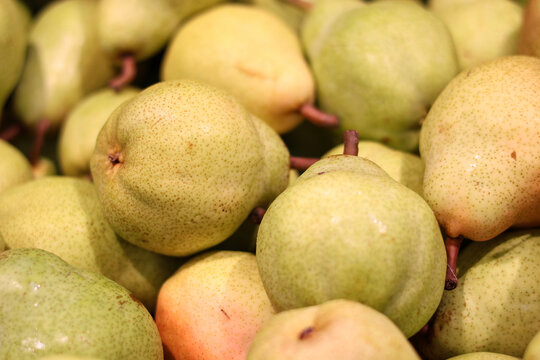 Ripe Pears Displayed at Grocery Store Market