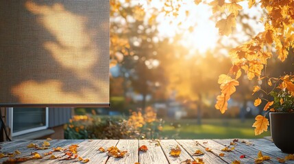  cozy deck with a beige roller shade partially down, filtering the golden autumn light, with leaves gently scattered on the ground