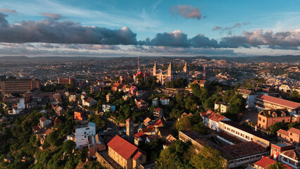 Aerial view of Antananarivo at sunset showcasing vibrant city life, lush landscapes, and historic architecture in Madagascar
