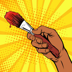 Afro american male hand with a painter brush. Drawing art illustration in pop art retro comic style