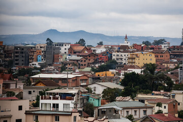 Discovering the charm of authentic houses in Antananarivo with colorful architecture and scenic hills in the background