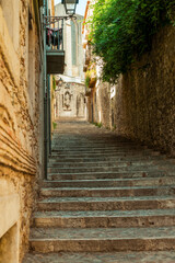 A charming empthy alley in the old town of Girona, Spain
