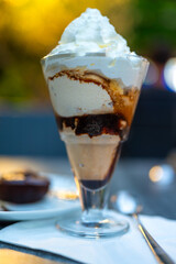  Coffee sundae with chocolate sauce and whipped cream on the top