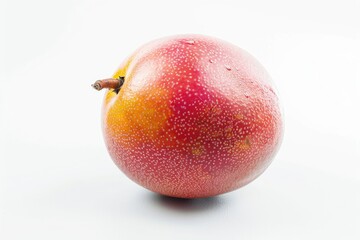 A single fruit sits on a clean white surface, ready for use or display