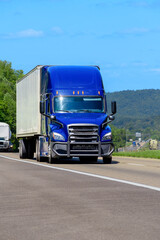 Blue Eighteen Wheeler Vertical Format With Copy Space