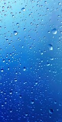 A textured blue water background with numerous droplets, suggesting freshness and natural water elements.