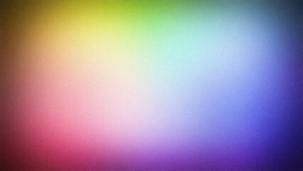 A vibrant 4K grainy gradient blending multiple shades of yellow, green, pink, blue, and purple. This colorful and dynamic backdrop is perfect for creative digital designs, banners, and wallpapers