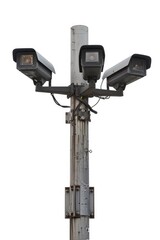 A street light with two cameras attached, suitable for surveillance and security themes