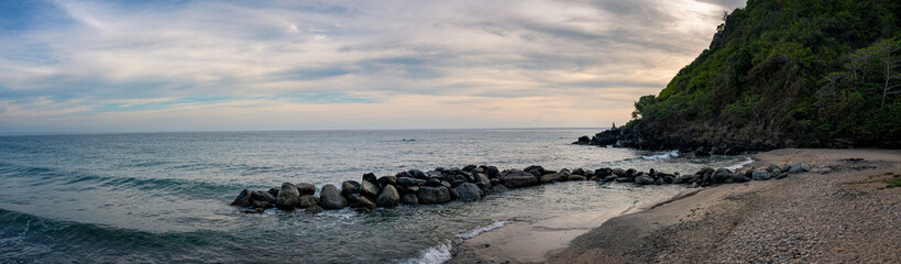 Panoramic view of beautiful and colorful sunrise at the Caribbean beach