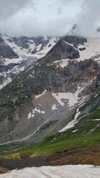 Mountain climbing near Grand Chol Ferret, in the Italian Alps, Pelle Ferret, on the Tour de Montblanc trail

