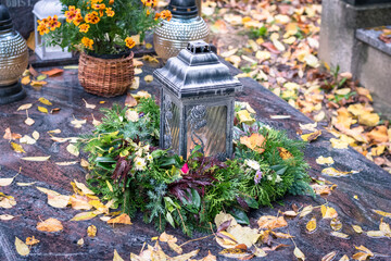 graves during All Saints Day, cemetery during religion holiday,autumn atmosphere